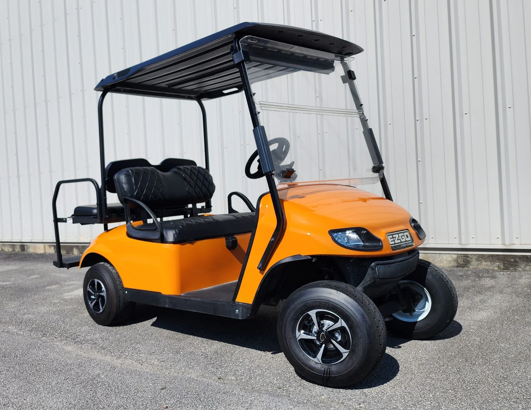 EZGO Golf Cart in Vibrant Orange